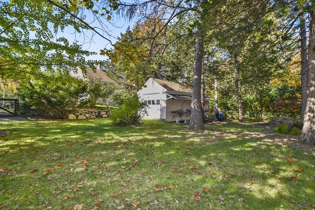 0 Cedar Street Burlington, MA 01803 - Photo 29 of 30 a backyard of a house with plants and large trees