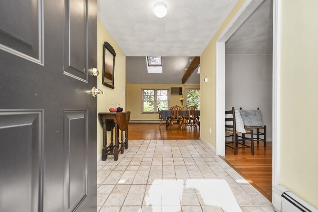 0 Cedar Street Burlington, MA 01803 - Photo 4 of 30 a hallway with dining area and livingroom view