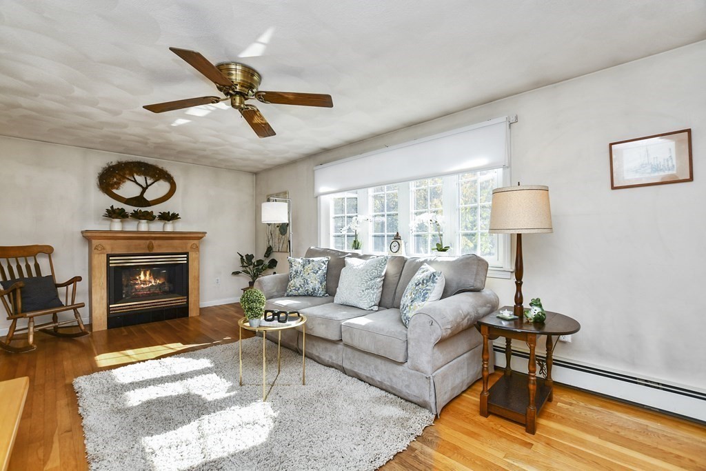 0 Cedar Street Burlington, MA 01803 - Photo 6 of 30 a living room with furniture and a fireplace