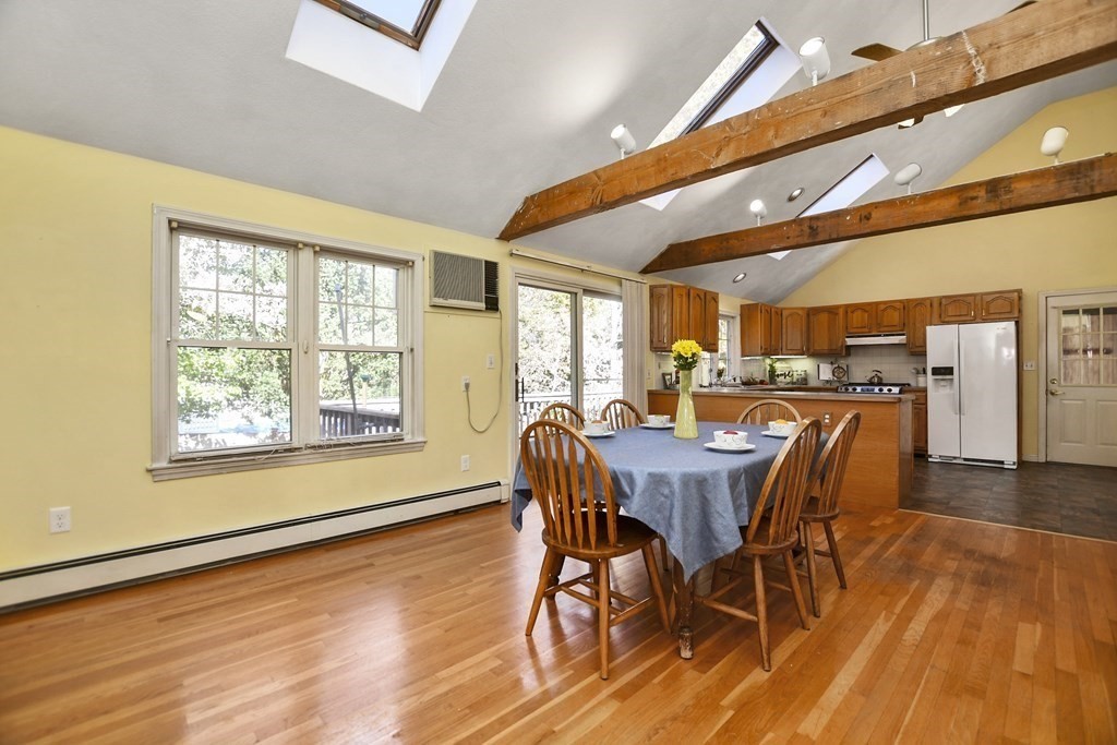 0 Cedar Street Burlington, MA 01803 - Photo 9 of 30 a dining room with furniture and wooden floor