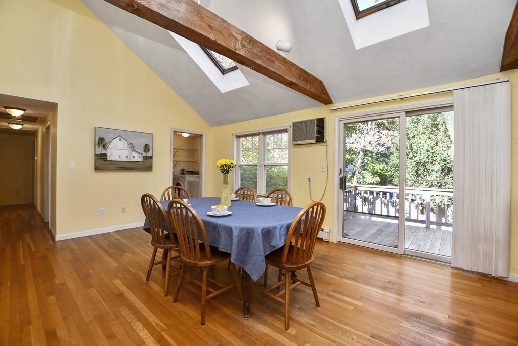 0 Cedar Street Burlington, MA 01803 - Photo 10 of 30 a view of a dining room with furniture window and wooden floor
