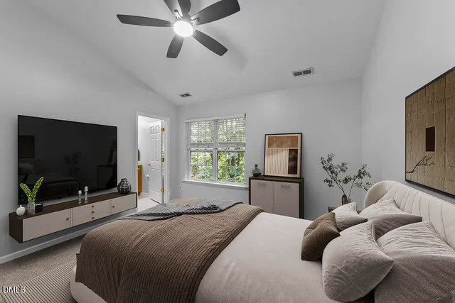 a view of an empty room with a fireplace