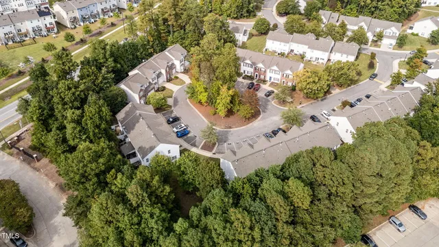 a large kitchen with stainless steel appliances granite countertop a stove a sink dishwasher and a refrigerator