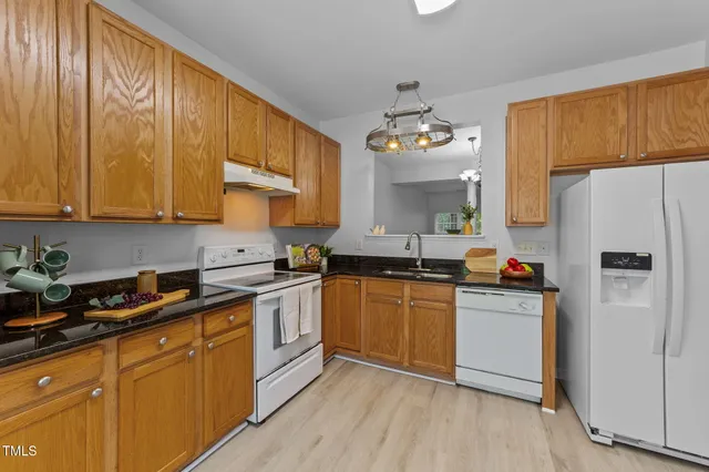 a picture of a bench in front of a wall