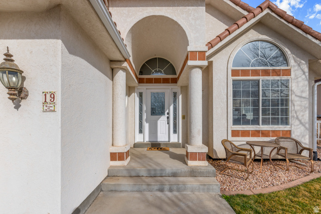 19 South 820 East Tooele, UT 84074 - Photo 17 of 46 Property entrance with stucco siding
