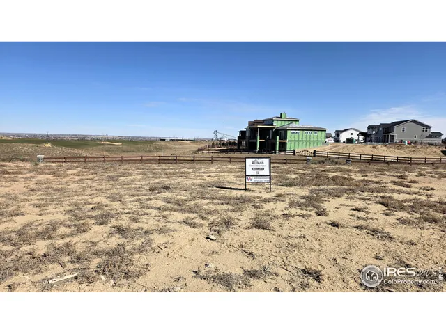 a bathroom with a sink and a view of ocean