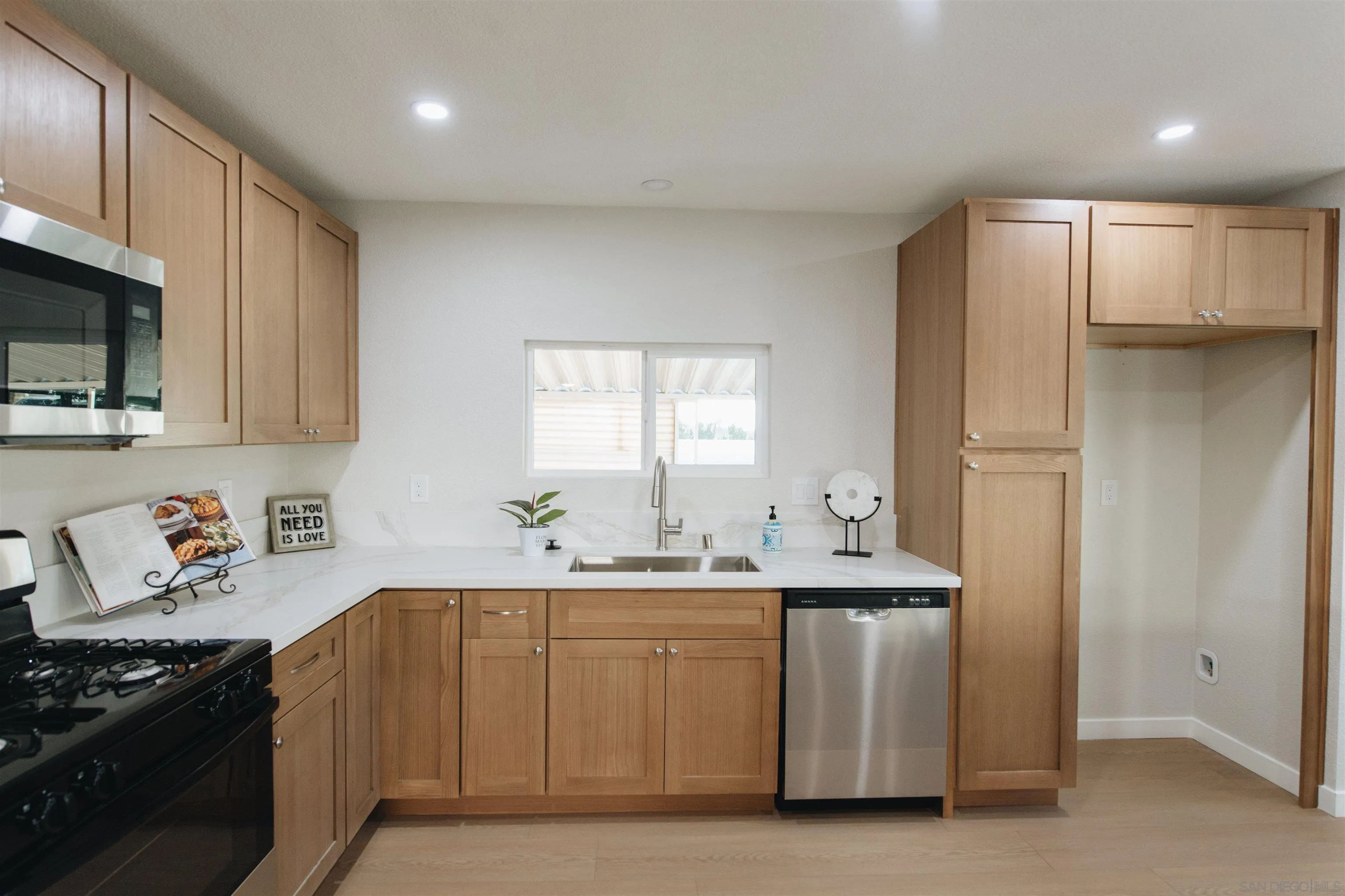 2400 Alpine Boulevard, Unit 8 Alpine, CA 91901 - Photo 13 of 26 a kitchen with stainless steel appliances granite countertop a sink stove and refrigerator