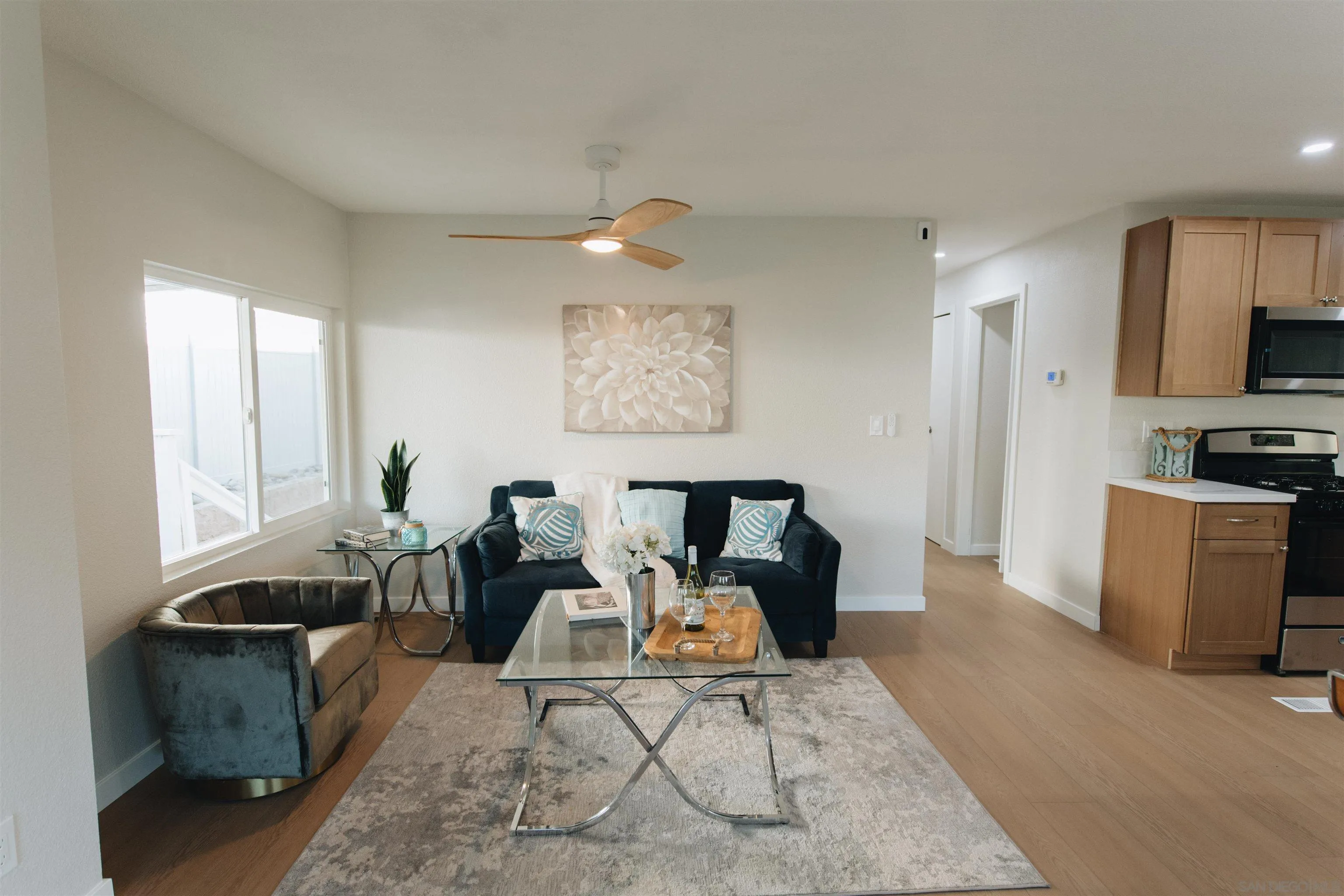 2400 Alpine Boulevard, Unit 8 Alpine, CA 91901 - Photo 15 of 26 a living room with furniture a rug and a flat screen tv