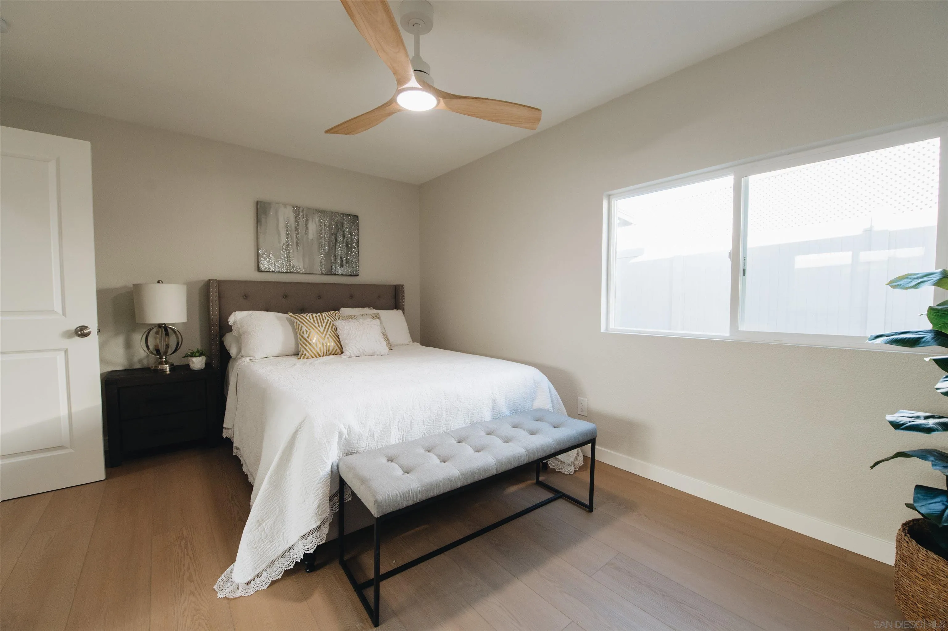 2400 Alpine Boulevard, Unit 8 Alpine, CA 91901 - Photo 10 of 26 a bedroom with a bed and a window