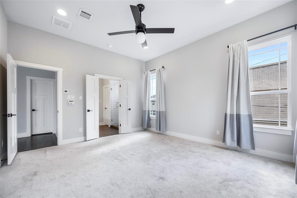 312 North Henderson Avenue, Unit 1 Dallas, TX 75214 - Photo 17 of 25 a view of empty room with a ceiling fan