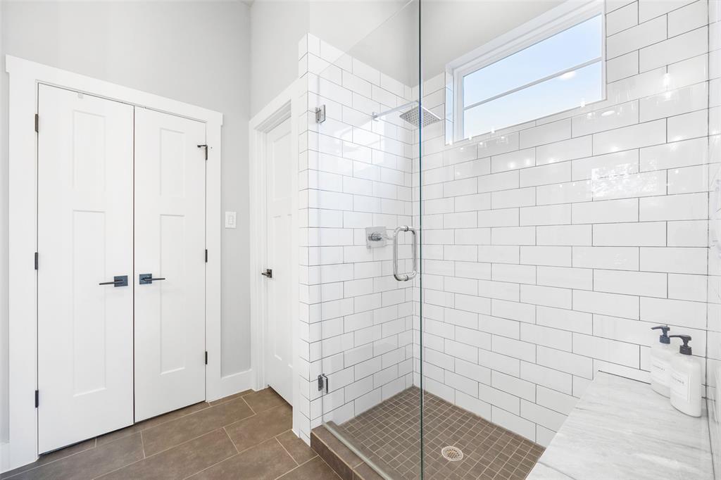 312 North Henderson Avenue, Unit 1 Dallas, TX 75214 - Photo 19 of 25 a bathroom with a shower