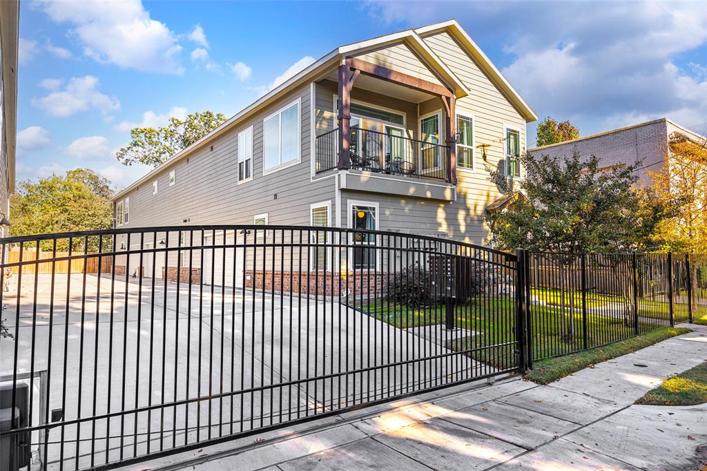 312 North Henderson Avenue, Unit 1 Dallas, TX 75214 - Photo 25 of 25 a view of a white house with a large windows