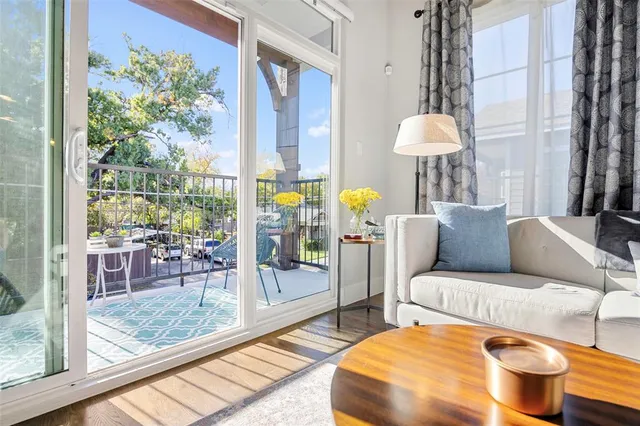 a living room with furniture and a table