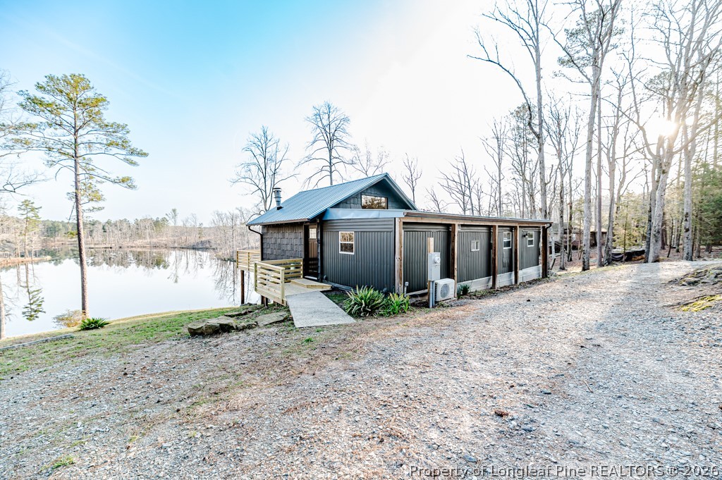 161 White Oak Street Carthage, NC 28327 - Photo 21 of 29 a house view with a backyard space