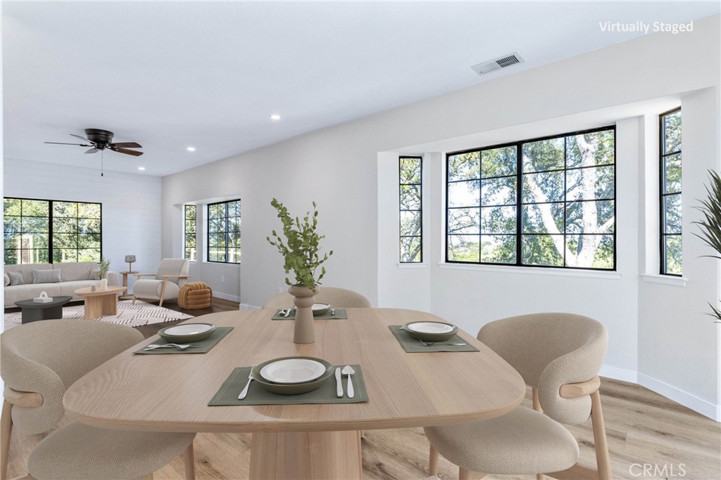 10870 Santa Ana Road Atascadero, CA 93422 - Photo 15 of 67 Multiple windows allow the natural light to pour into the room. Photo has been virtually staged.