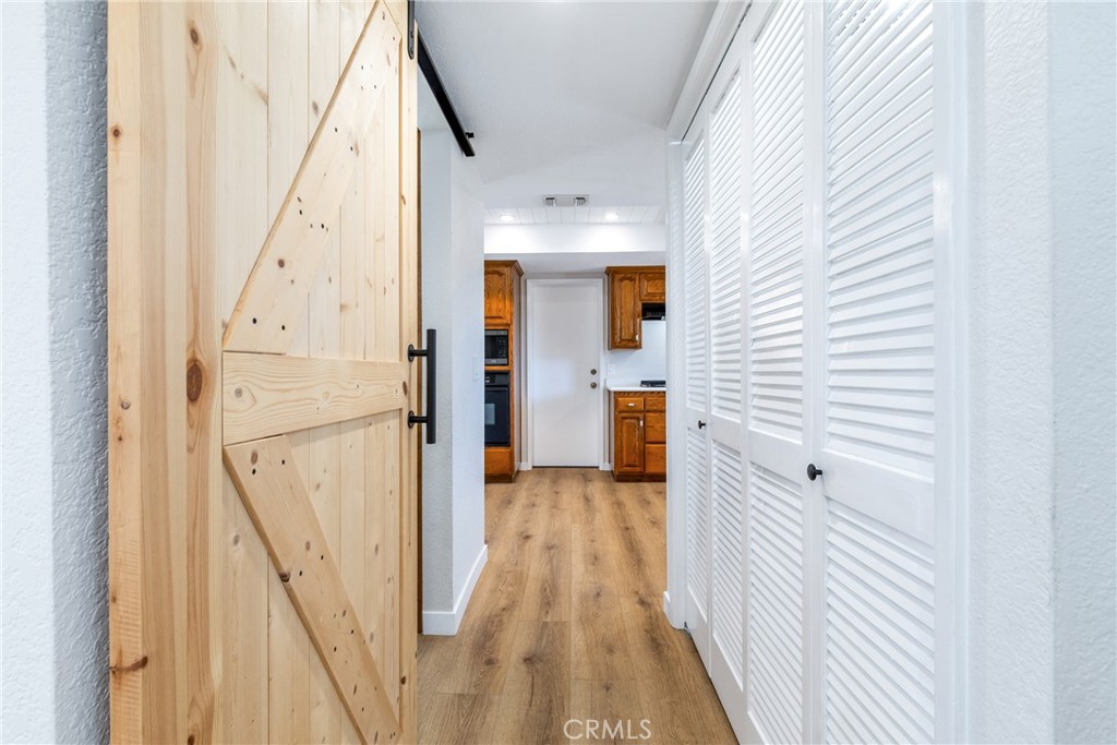 10870 Santa Ana Road Atascadero, CA 93422 - Photo 26 of 67 Walking past the kitchen we find a half bath and laundry area.