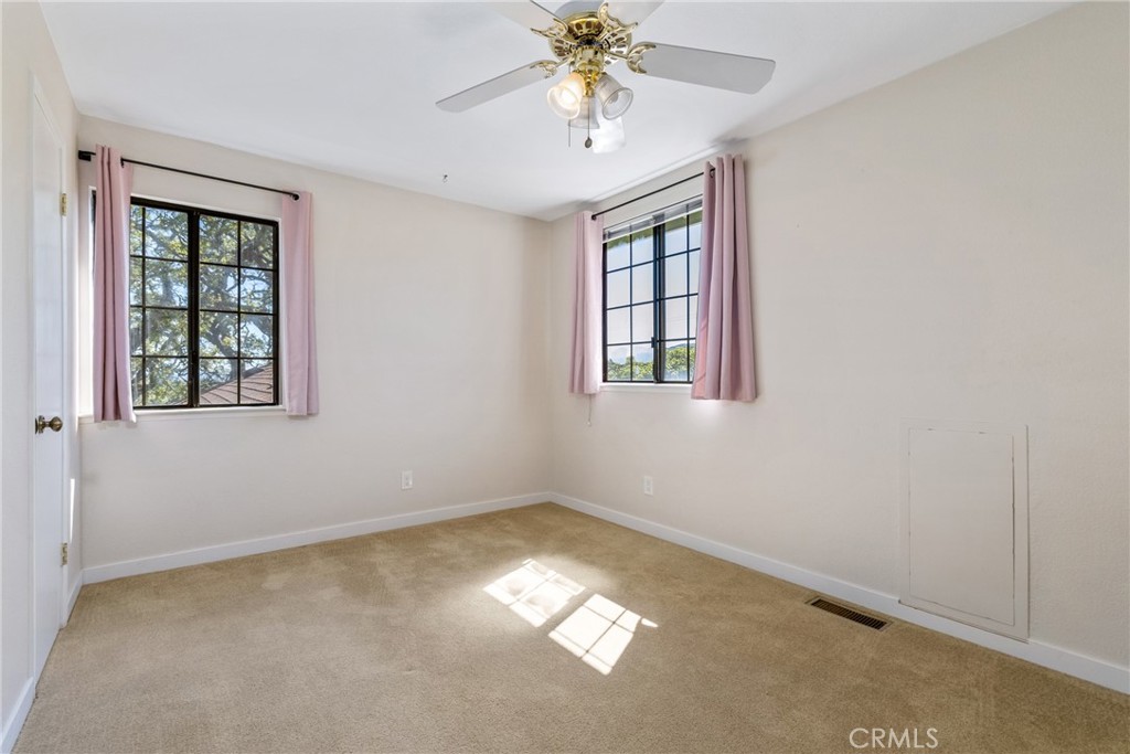 10870 Santa Ana Road Atascadero, CA 93422 - Photo 44 of 67 Bedroom 3 has windows that offer great views and a walk-in closet!