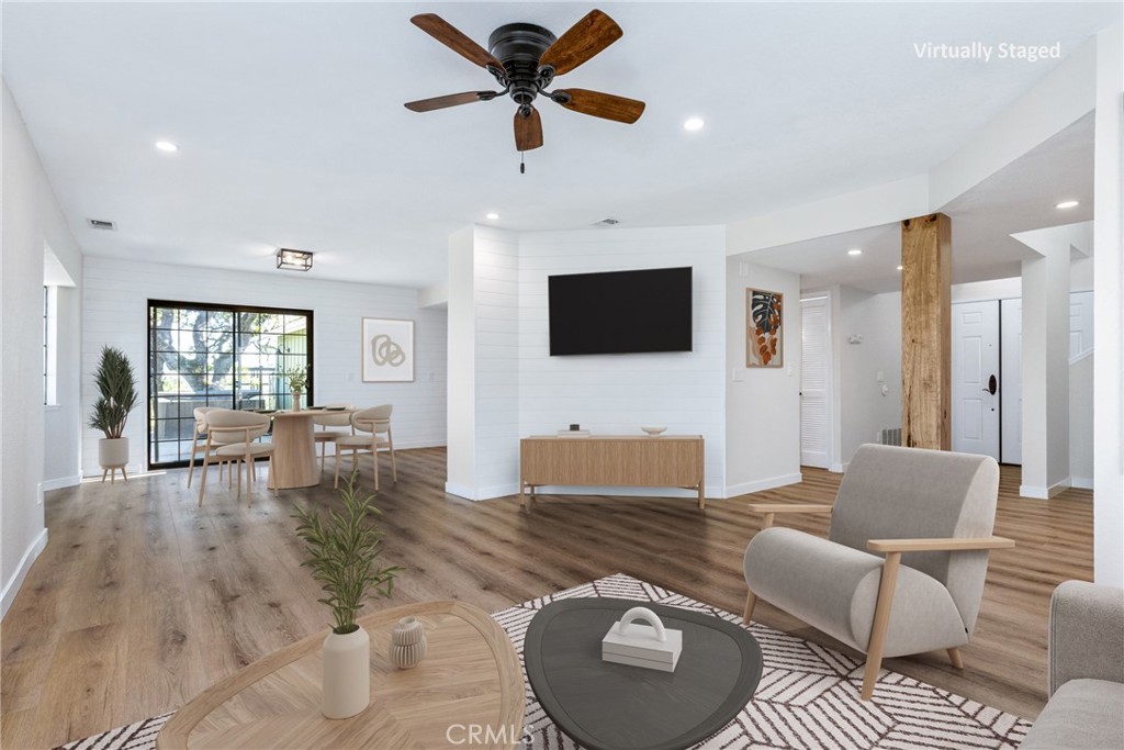 10870 Santa Ana Road Atascadero, CA 93422 - Photo 10 of 67 The living room flows effortlessly into the dining area, great for entertaining and everyday living. Photo has been virtually staged.