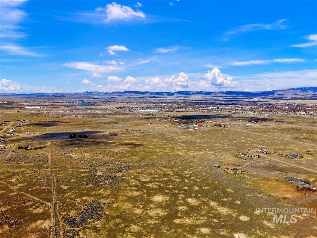 51/ Southwest Smith Rd Mountain Mountain Home, ID 83647 - Photo 7 of 20 View of rural area with a mountainous background and a desert landscape