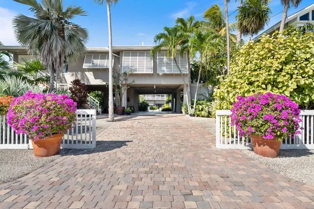 a entryway with stairs and a garden