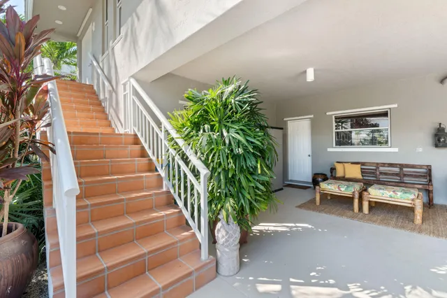 a view of a livingroom with furniture and a garage
