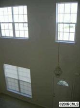 15330 McClure Bridge Road Charlotte, NC 28277 - Photo 5 of 6 an empty room with a window