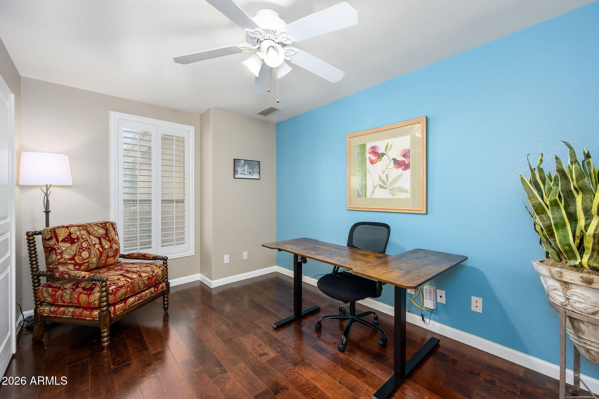 3136 East Roveen Avenue Phoenix, AZ 85032 - Photo 21 of 38 a workspace with furniture and a window