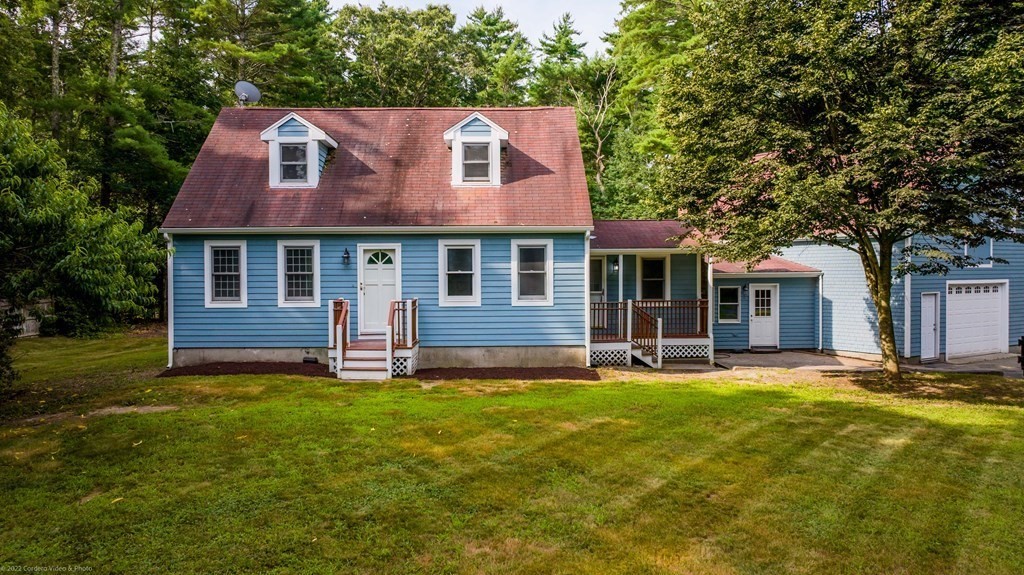 1 Canterberry Path Carver, MA 02330 - Photo 1 of 40 front view of a house with a yard