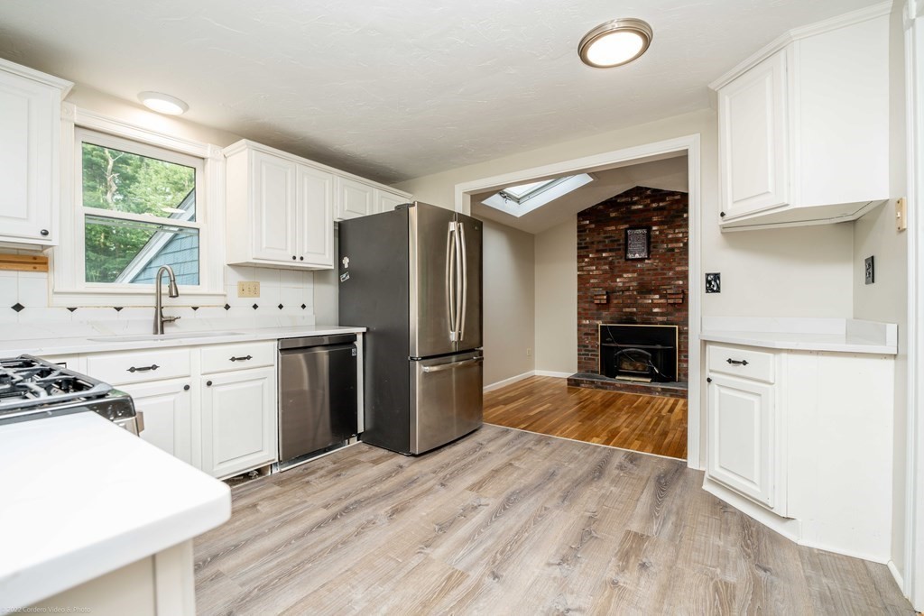 1 Canterberry Path Carver, MA 02330 - Photo 12 of 40 a kitchen with a refrigerator sink and stove