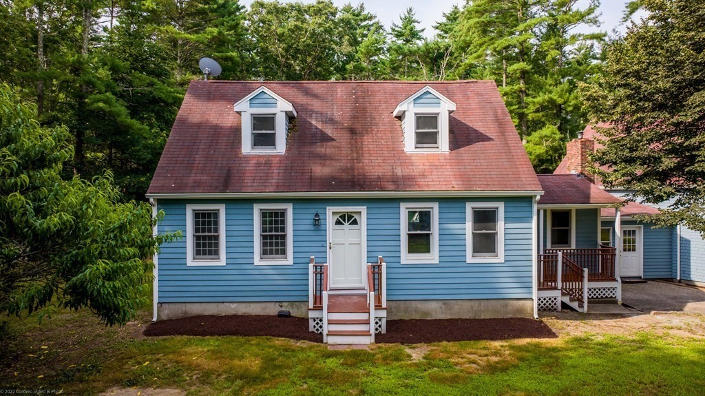 1 Canterberry Path Carver, MA 02330 - Photo 2 of 40 a front view of a house with a yard