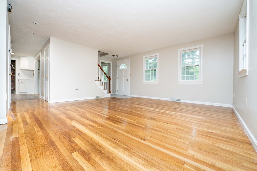 1 Canterberry Path Carver, MA 02330 - Photo 6 of 40 a view of empty room with wooden floor and fan