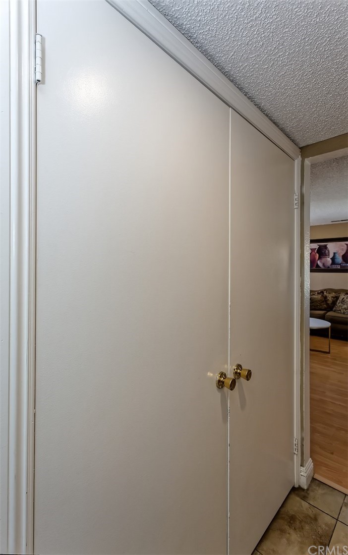 10829 Pepper Street Adelanto, CA 92301 - Photo 25 of 48 a view of a room with wooden floor