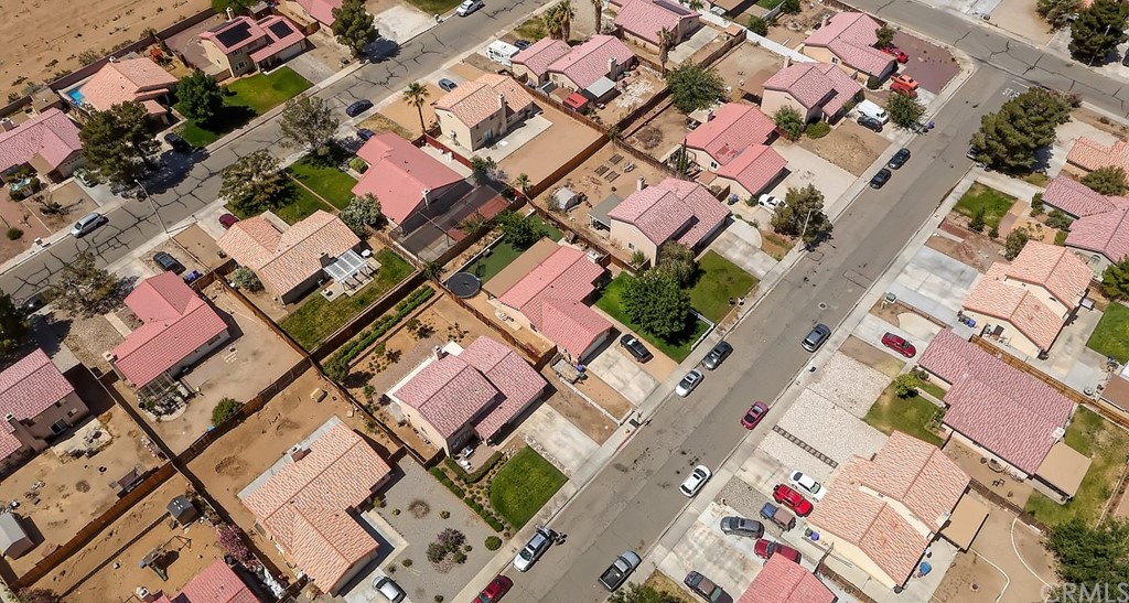 10829 Pepper Street Adelanto, CA 92301 - Photo 47 of 48 an aerial view of a house with a yard