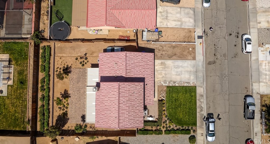 10829 Pepper Street Adelanto, CA 92301 - Photo 8 of 48 a bathroom with a sink and a mirror