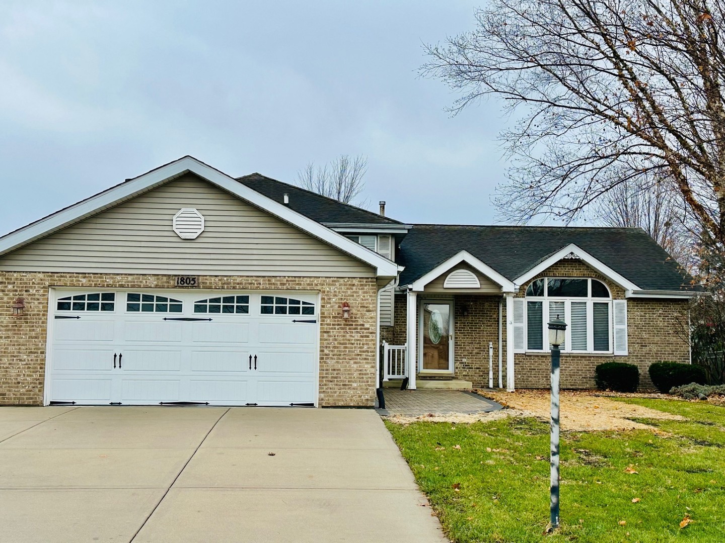 1805 Pebble Beach Drive Plainfield, IL 60586 - Photo 2 of 18 a front view of a house with a yard