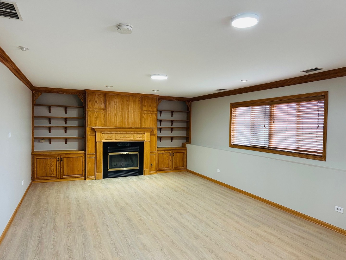 1805 Pebble Beach Drive Plainfield, IL 60586 - Photo 5 of 18 a view of a livingroom with a fireplace and window