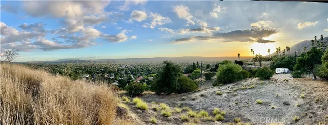 a view of a lake with a yard