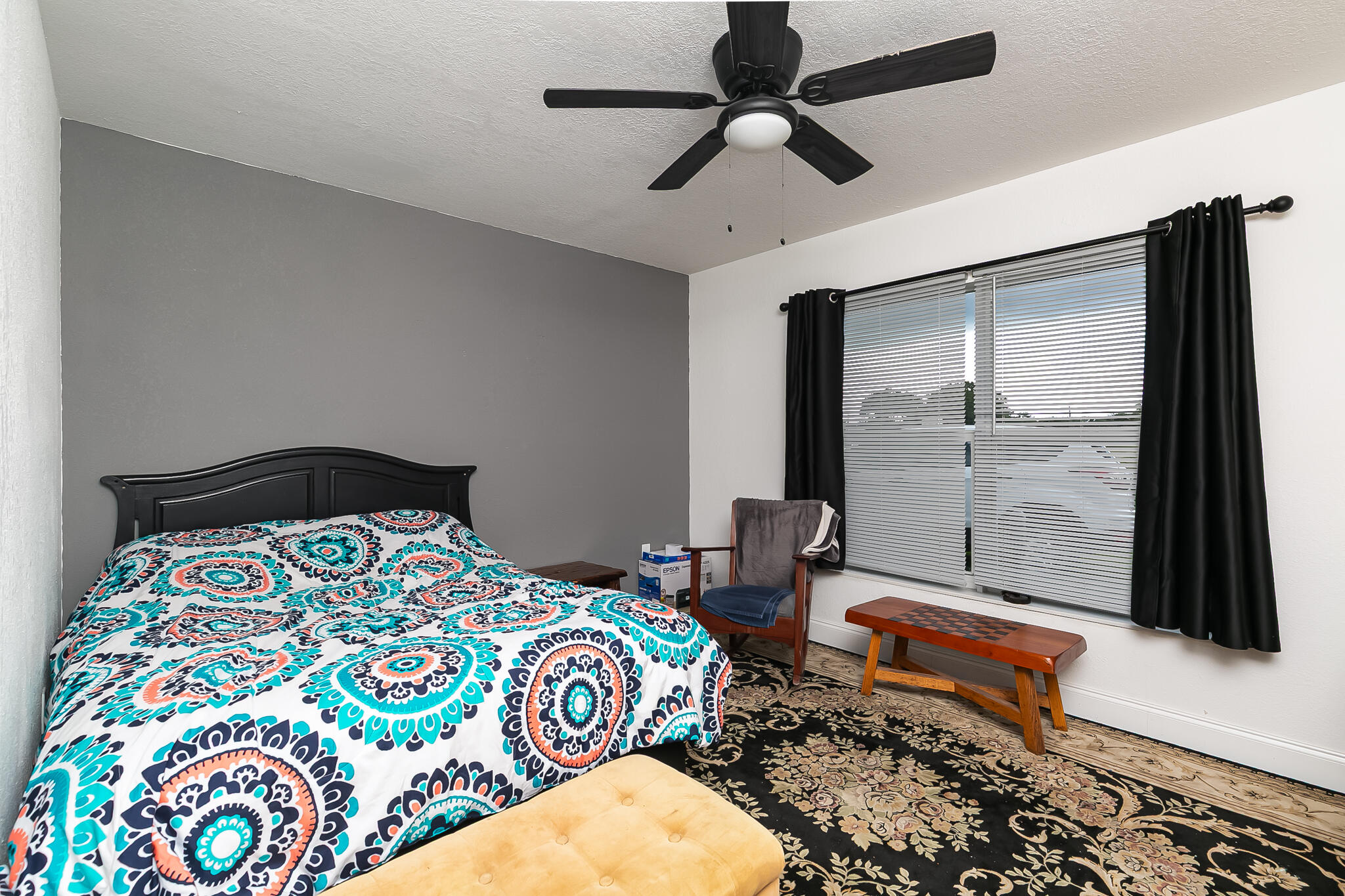 1141 Orange Loop Okeechobee, FL 34974 - Photo 15 of 20 a bedroom with a bed and a window