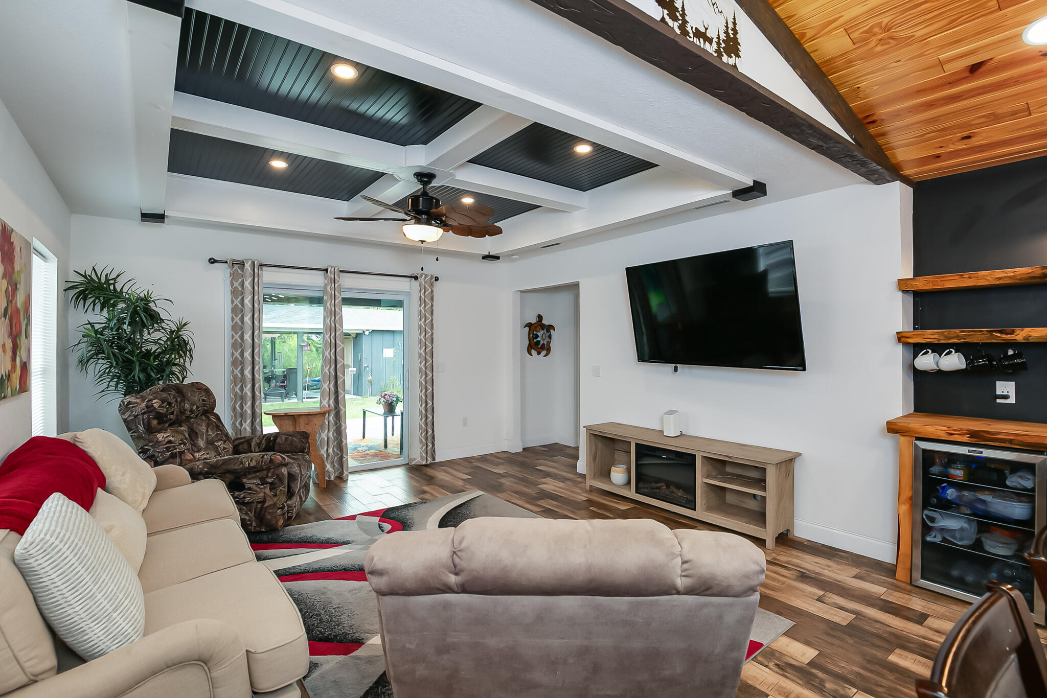 1141 Orange Loop Okeechobee, FL 34974 - Photo 6 of 20 a living room with furniture and a flat screen tv