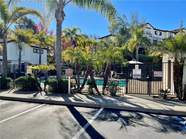 a view of a chairs and table in the patio