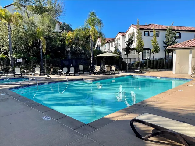 a view of a park with large trees