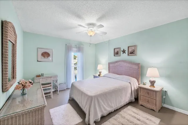 a view of a balcony with chairs