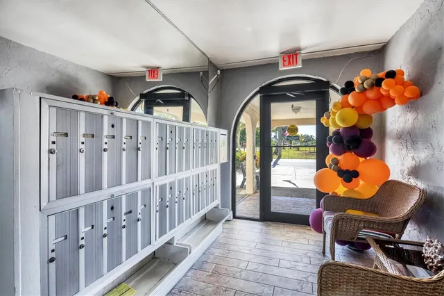 an aerial view of a house with a yard basket ball court and outdoor seating