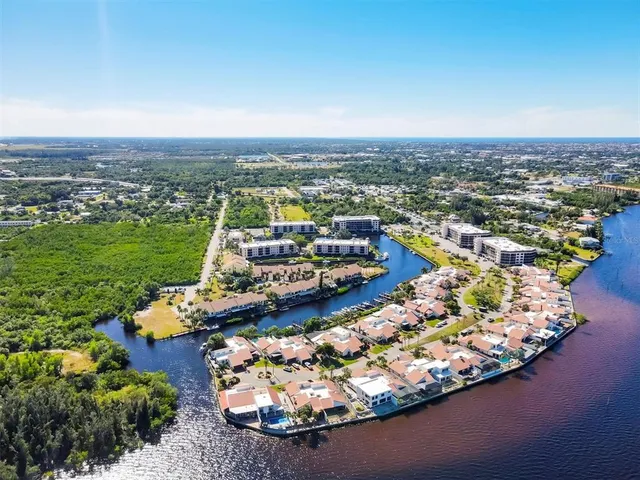an aerial view of a house having yard