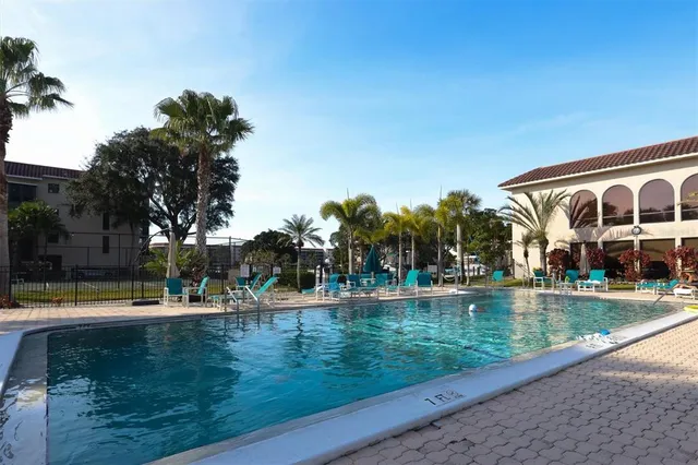 a view of a swimming pool and lake