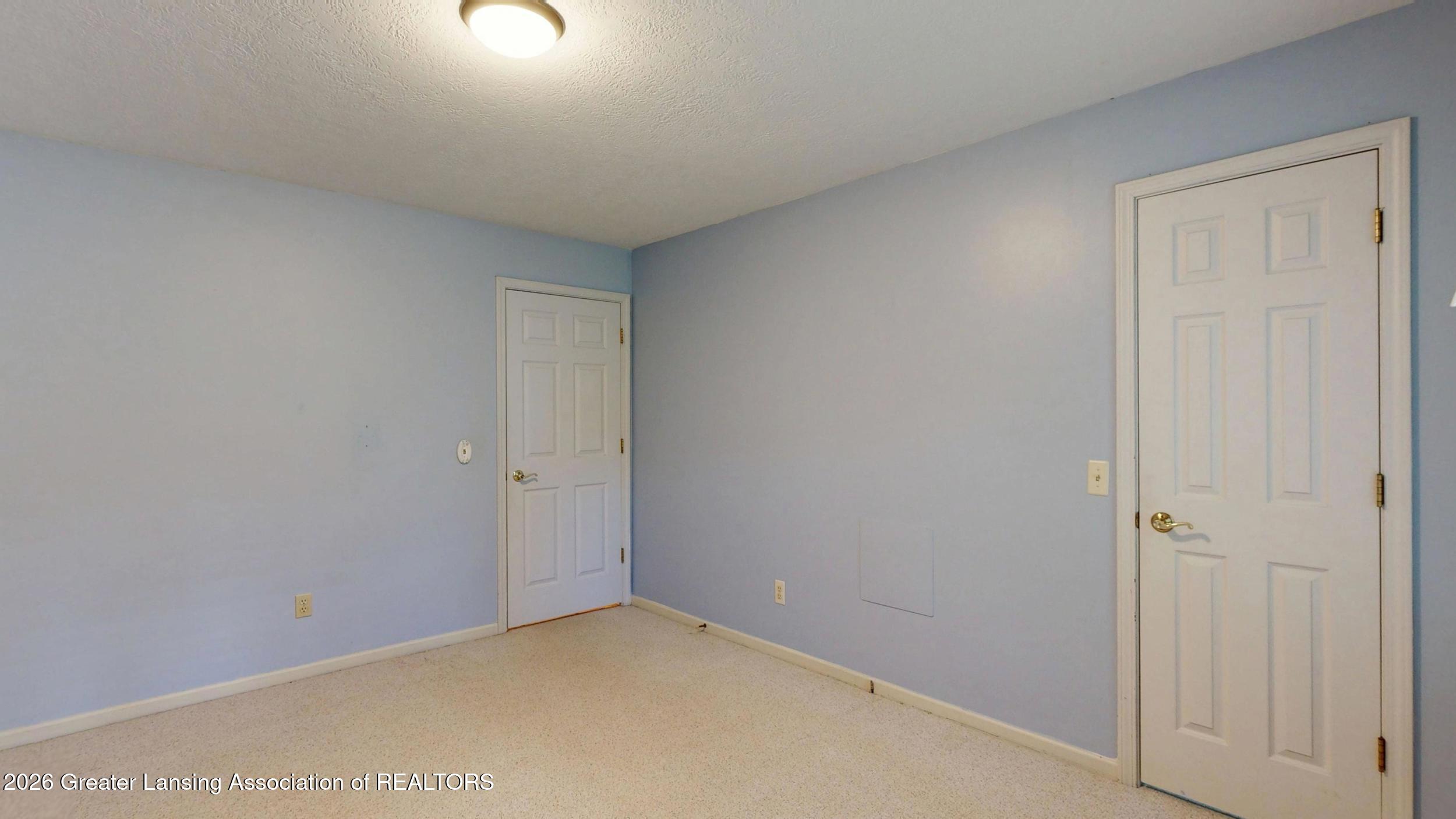 6464 Lounsbury Road Williamston, MI 48895 - Photo 23 of 92 1st Floor Bedroom