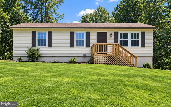 a view of a house with a garden