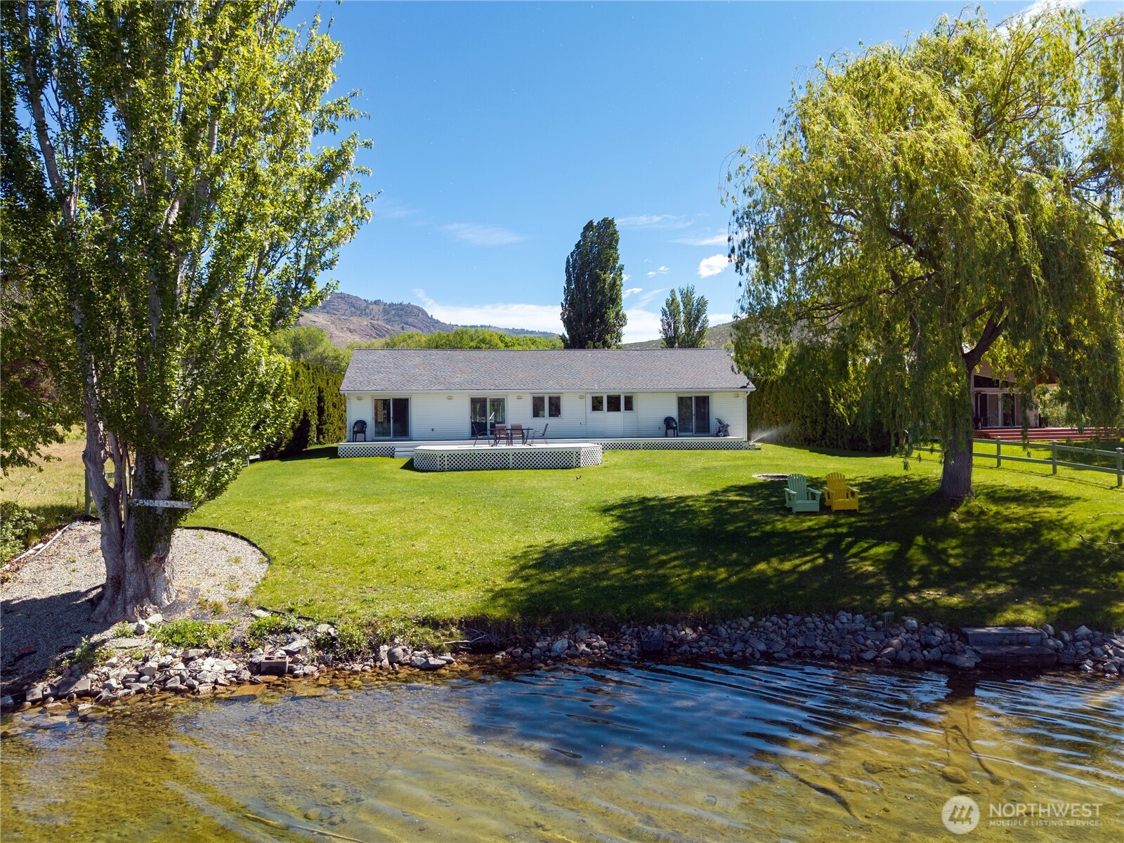 428 Eastlake Road Oroville, WA 98844 - Photo 1 of 34 a view of a house with a yard