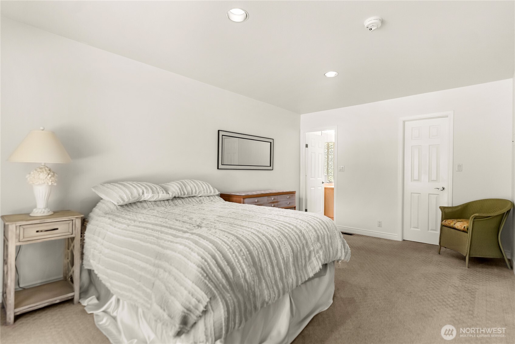 428 Eastlake Road Oroville, WA 98844 - Photo 16 of 34 a spacious bedroom with a bed and a cabinets
