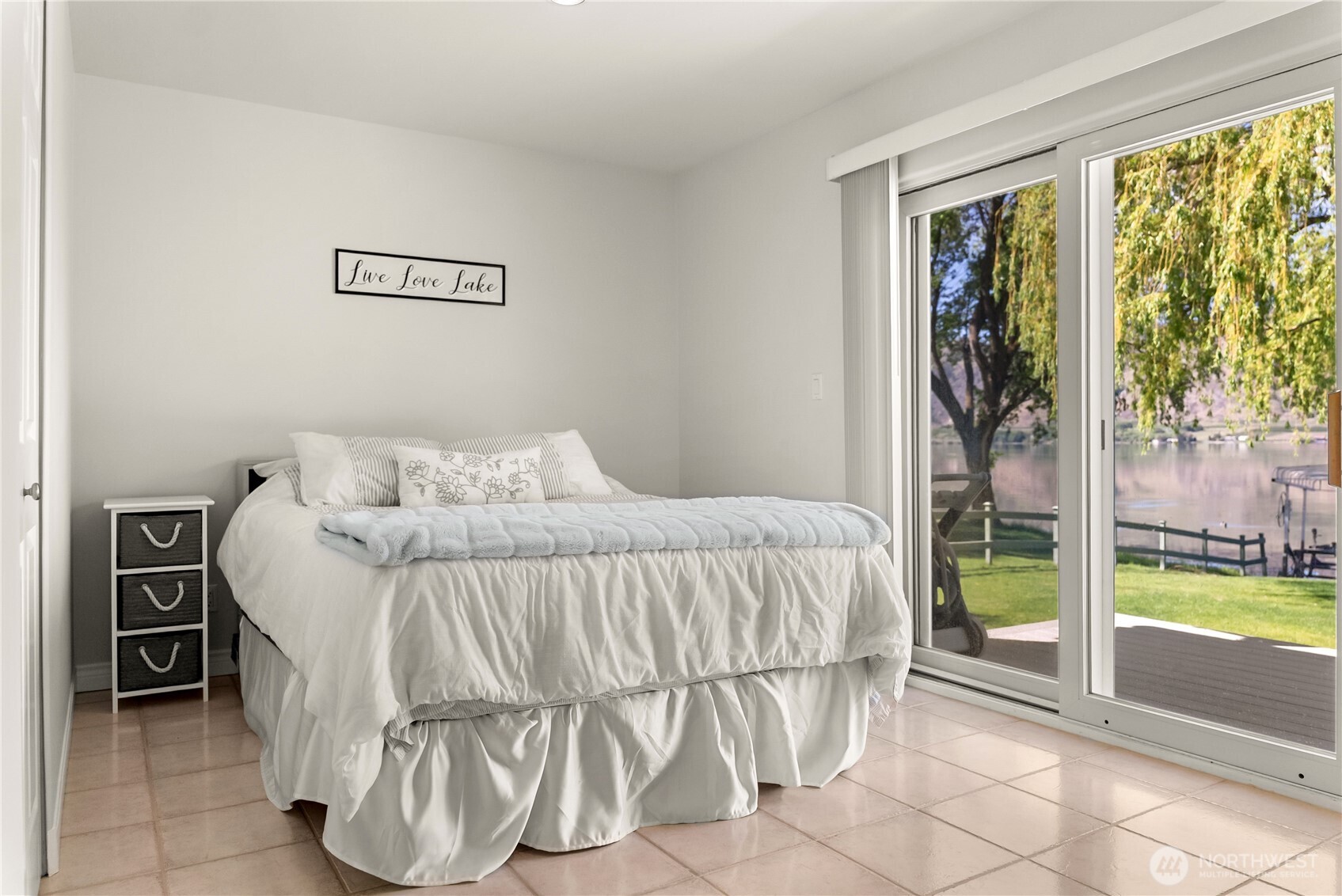 428 Eastlake Road Oroville, WA 98844 - Photo 18 of 34 a bedroom with a bed and a view of balcony